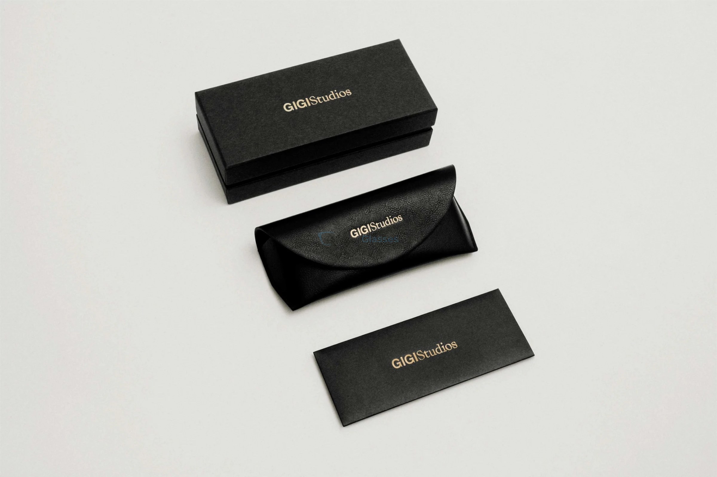   GIGI Studios SIMON 1,  GOLD BLACK, SOLID GREEN POLARIZED