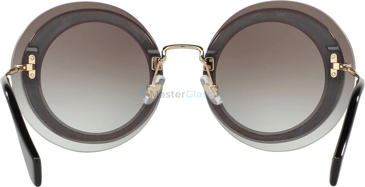 Солнцезащитные очки MIU MIU Core Collection MU 10RS UES0A7 Transparent/fabric Glitter Sil